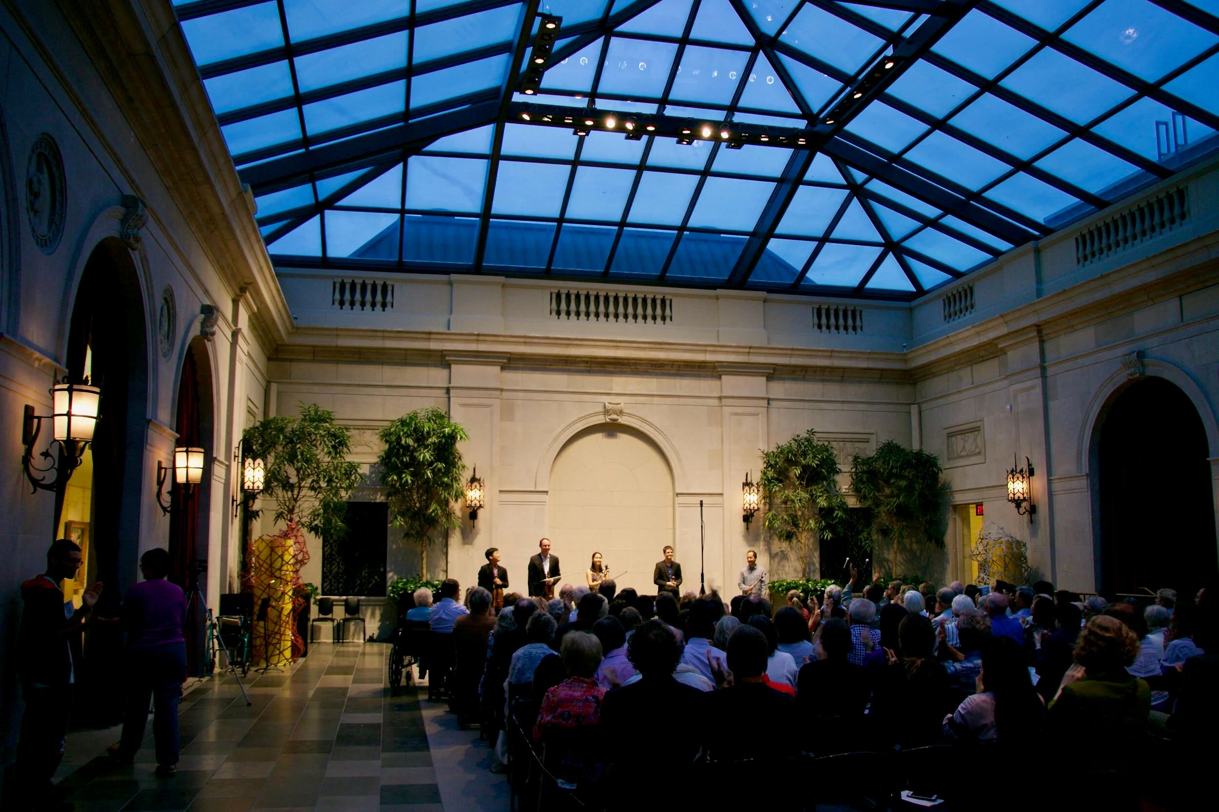 A full skylit hall at a VIVO concert